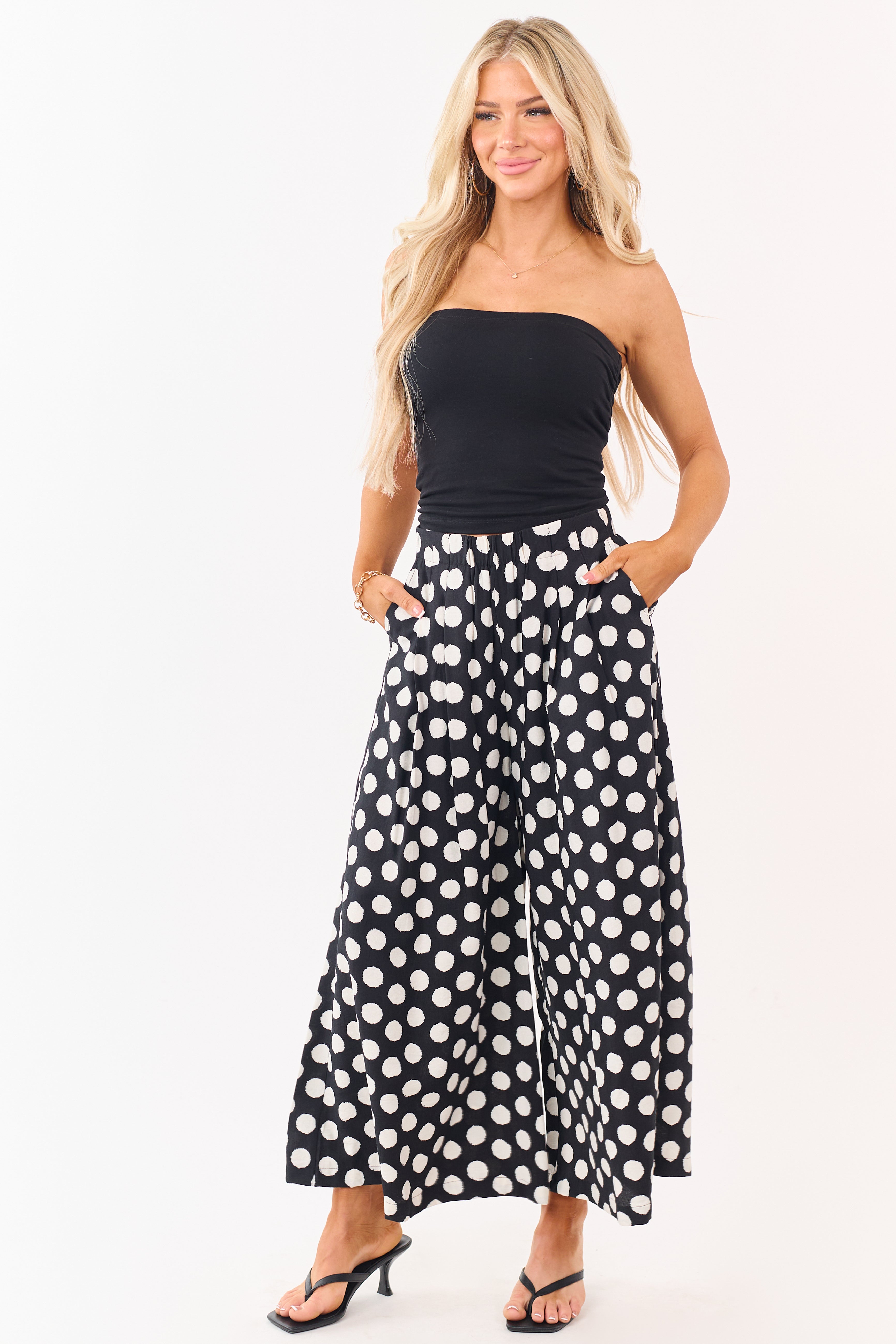 Pantalones de lunares en negro y crema de pierna ancha - elegantes y fluidos que destacan