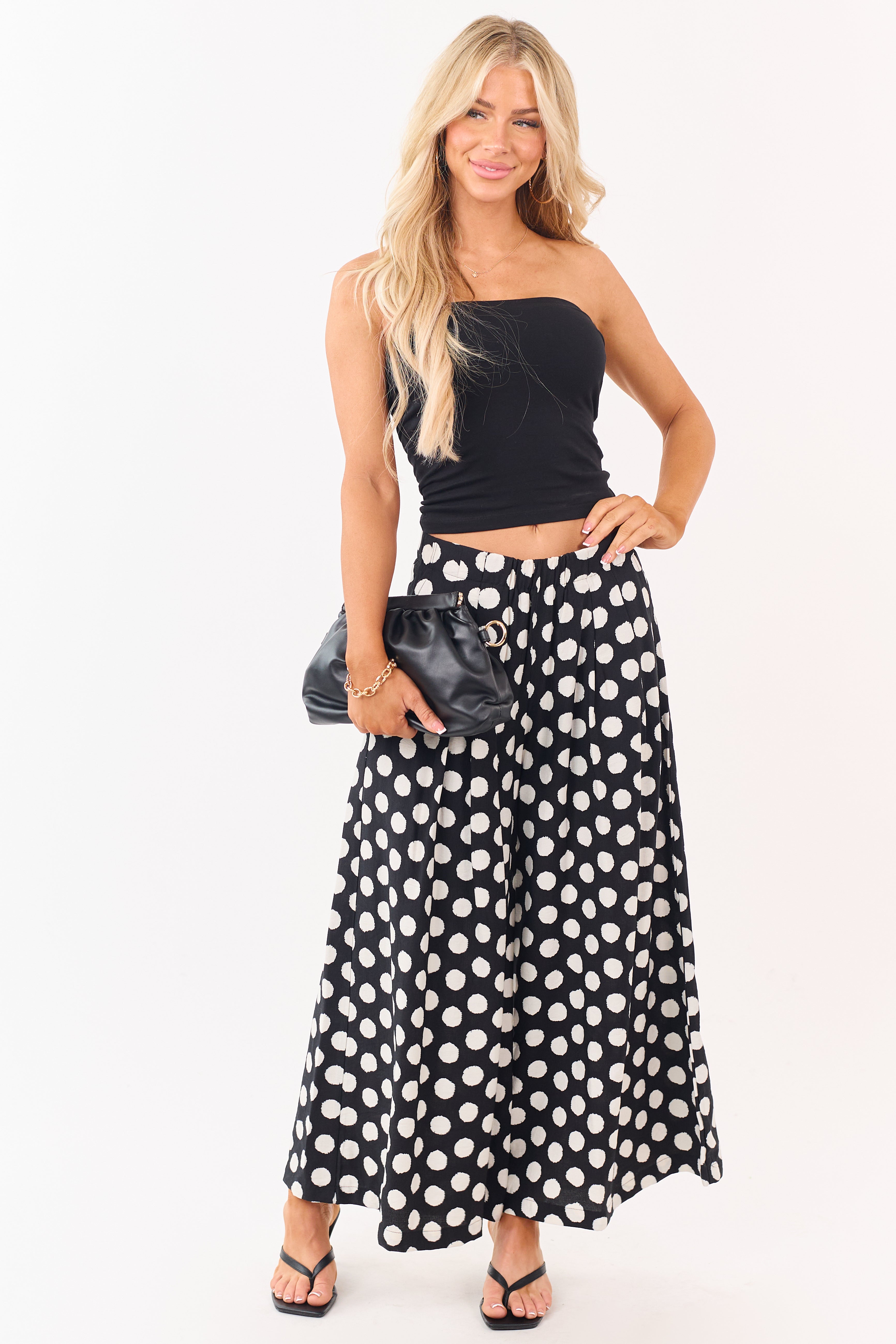 Pantalones de lunares en negro y crema de pierna ancha - elegantes y fluidos que destacan