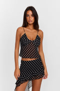 Top negro con lunares de Clara