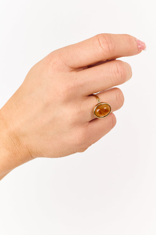 Anillo grande y audaz con piedra ovalada de resina de arenisca