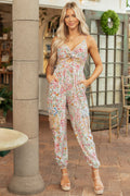Mono estampado floral vainilla con nudo frontal y bolsillos cargo
